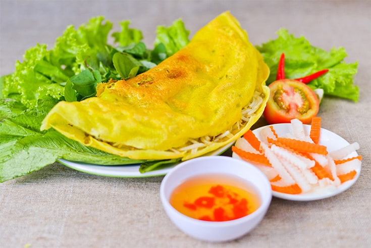 banh xeo - what to eat in Con Market