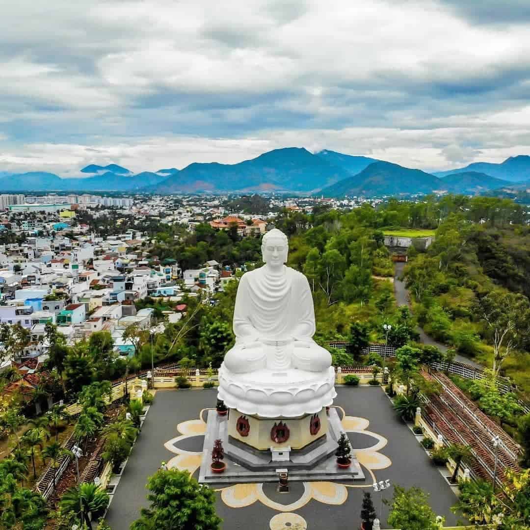 White Buddha statue in Long Son pagoda